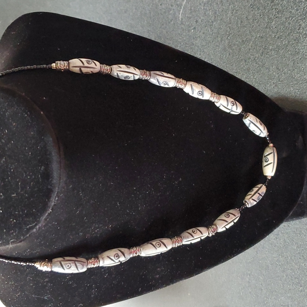 Man's Carved Bone Necklace.